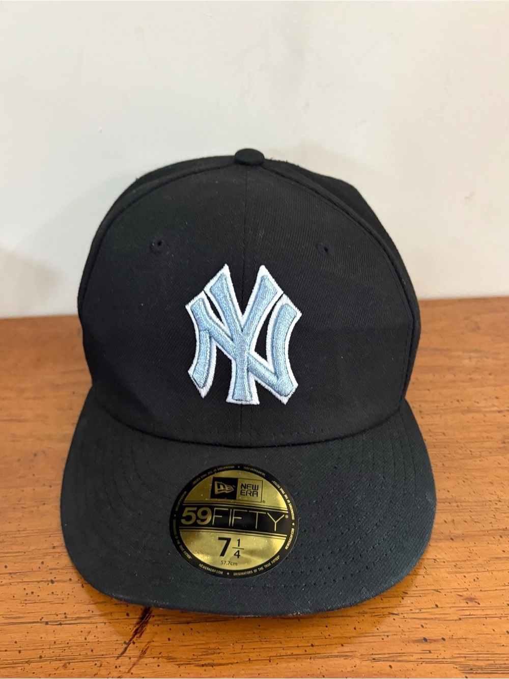 New Era Black Cap with Light Blue NY Logo